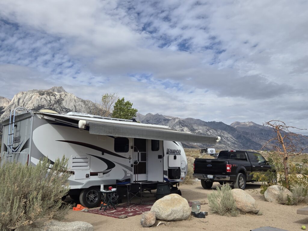Camping trailer set up on site